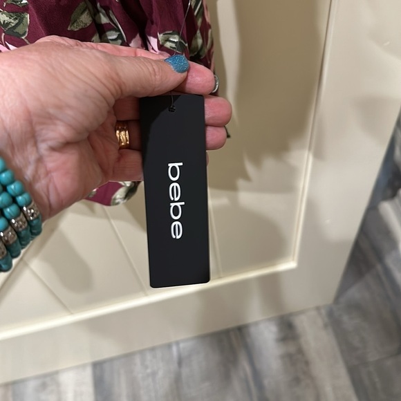 NWT Bebe floral flirty dress. Size small - Picture 2 of 7